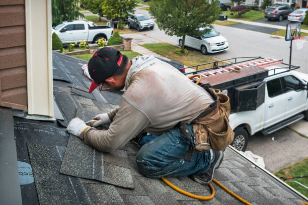 Professional Roof Repair technician working in Crabtree, OR